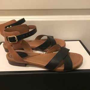 Black/brown Clarks ankle strap sandals